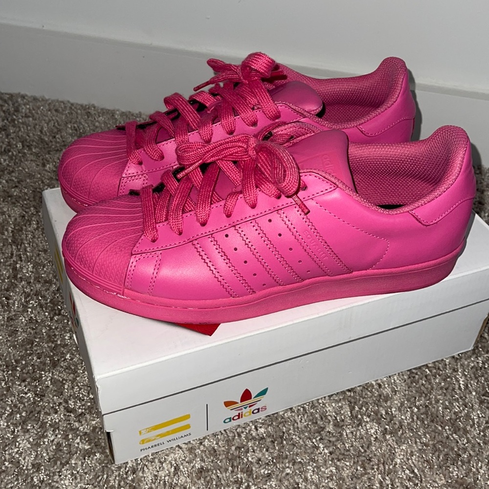 Pink Adidas X Pharrell superstar Men’s 8, Women’s 9.5